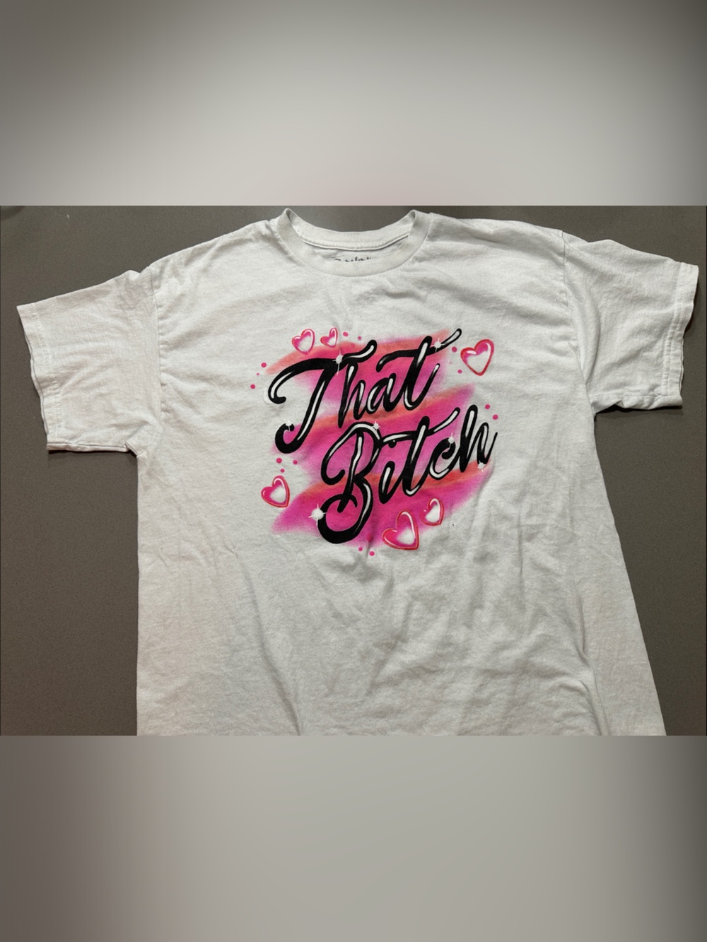 Spencer's White Short-Sleeve Tee with Pink and Black Airbrush graphic